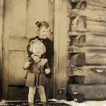 Public photo from ancestry.com website 
Berdie Clark poses with younger sister Carla on the front porch of a cabin in Hope, circa 1941. The siblings were both child of longtime Hope residents Emma and Carl Clark.