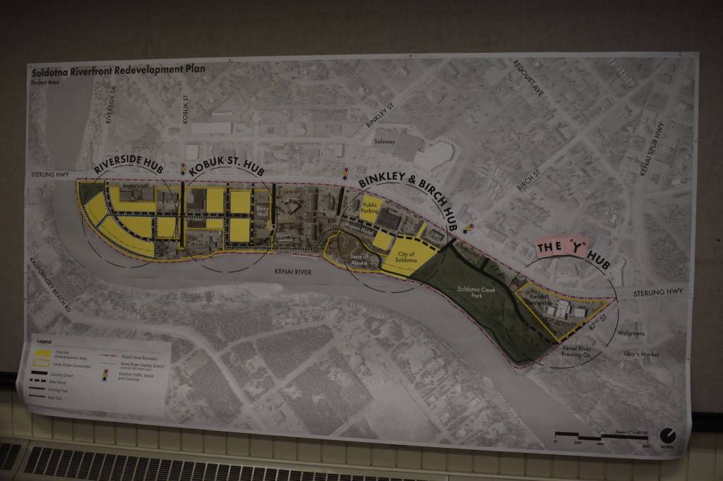 A full map of the Soldotna Riverfront Redevelopment Plan, with different hubs of activity identified, is shown off on Thursday, Jan. 12, 2023, at the Soldotna Riverfront Redevelopment Open House at the Soldotna Regional Sports Complex in Soldotna, Alaska. (Jake Dye/Peninsula Clarion)