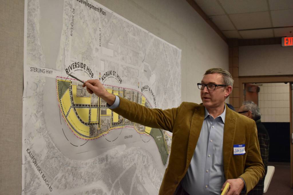 Project Manager Jason Graf points to a map while answering questions from attendees on Thursday, Jan. 12, 2023, at the Soldotna Riverfront Redevelopment Open House at the Soldotna Regional Sports Complex in Soldotna, Alaska. (Jake Dye/Peninsula Clarion)