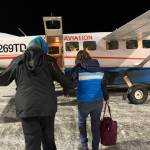 A passenger boards a Kenai-bound Grant Aviation flight at Ted Stevens Anchorage International Airport on Friday, Jan. 6 in Anchorage, Alaska. (Ashlyn O'Hara/Peninsula Clarion)