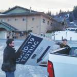 South Peninsula Hospital employees remove COVID-19 testing signs from South Peninsula Hospital test site Friday Jan. 13, 2023. (Photo from Derotha Ferraro/South Peninsula Hospital)