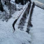 A train derailed by a large natural avalanche near Kern Creek is covered snow, Jan. 1, 2023, in Girdwood, Alaska. (Photo via Chugach Avalanche Center/Travis Smith)