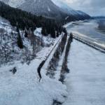 A train derailed by a large natural avalanche near Kern Creek is covered snow, Jan. 1, 2023, in Girdwood, Alaska. (Photo via Chugach Avalanche Center/Travis Smith)