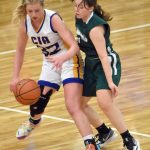 Cook Inlet Academys Tatum Rozak dribbles against Birchwood Christians Eden Becker on Saturday, Jan. 21, 2023, at Cook Inlet Academy near Soldotna, Alaska. (Photo by Jeff Helminiak/Peninsula Clarion)