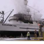 Photos by Nika Wolfe
Emergency personnel respond to a fire on R/V Qualifier, in the Northern Enterprises Boatyard on Kachemak Drive, Jan. 19.