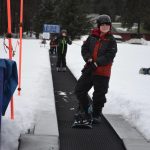Seward Middle School students ride the magic carpet at Alyeska Resort in Girdwood, Alaska, on Jan. 24 2023. (Photo courtesy Myla Lijemark)