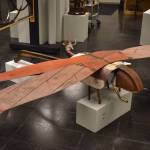 A large metal dragonfly sculpted by Jacob Nabholz commands a space on the floor Tuesday, Jan. 31, 2023, at the Kenai Art Center, in Kenai, Alaska, as part of Metalwork & Play. (Jake Dye/Peninsula Clarion)