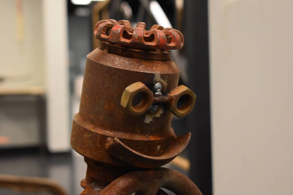 Recognizable components make up this metal face seen in a sculpture by Jacob Nabholz, as seen on Tuesday, Jan. 31, 2023, at the Kenai Art Center, in Kenai, Alaska. The sculpture is part of Metalwork & Play. (Jake Dye/Peninsula Clarion)