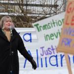 Rep. Sara Hannan of Juneau speaks to a crowd of climate activists who held a rally outside the Alaska State Capitol Friday, Feb. 3, 2023, to advocate for legislative action to improve Alaskas renewable energy development and future sustainability. (Clarise Larson / Juneau Empire)