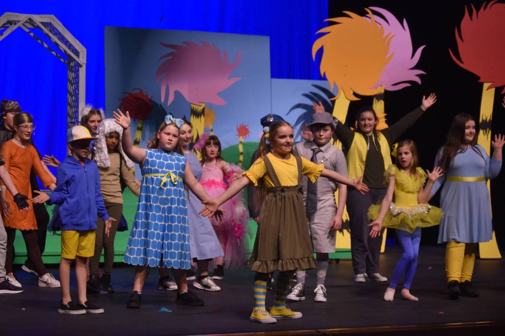 Morgan Hooper, as Jojo, and the cast of Triumvirate Theatres production of Seussical rehearse on Wednesday, Feb. 8, 2023, in the Renee C. Henderson Auditorium at Kenai Central High School in Kenai, Alaska. (Jake Dye/Peninsula Clarion)