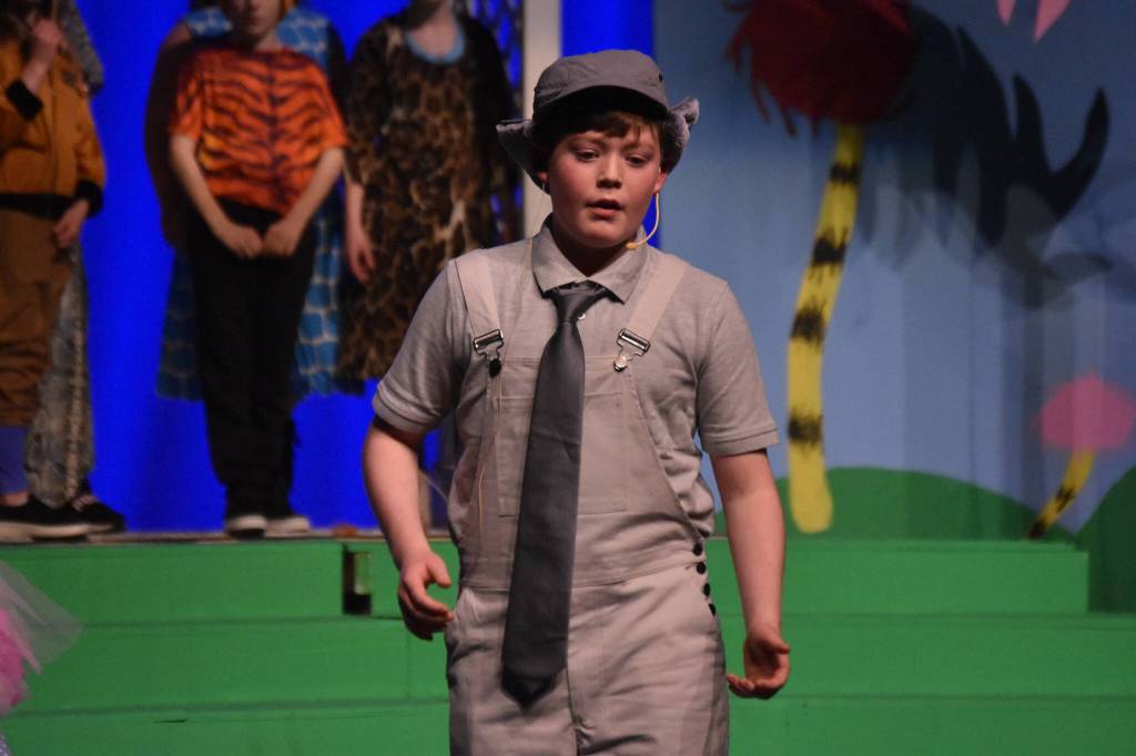 Bowe Meyers, as Horton, delivers a solo during a rehearsal of Triumvirate Theatres production of Seussical on Wednesday, Feb. 8, 2023, in the Renee C. Henderson Auditorium at Kenai Central High School in Kenai, Alaska. (Jake Dye/Peninsula Clarion)