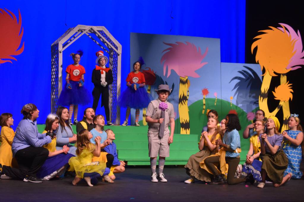Bowe Meyers, as Horton, and the cast of Triumvirate Theatres production of Seussical rehearse on Wednesday, Feb. 8, 2023, in the Renee C. Henderson Auditorium at Kenai Central High School in Kenai, Alaska. (Jake Dye/Peninsula Clarion)
