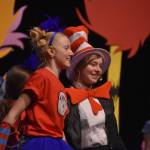 The cast of Triumvirate Theatres production of Seussical, portraying Thing 1 and The Cat in the Hat rehearse on Wednesday, Feb. 8, 2023, in the Renee C. Henderson Auditorium at Kenai Central High School in Kenai, Alaska. (Jake Dye/Peninsula Clarion)