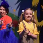 Morgan Hooper (right) and another member of Triumvirate Theatres production of Seussical rehearse on Wednesday, Feb. 8, 2023, in the Renee C. Henderson Auditorium at Kenai Central High School in Kenai, Alaska. (Jake Dye/Peninsula Clarion)