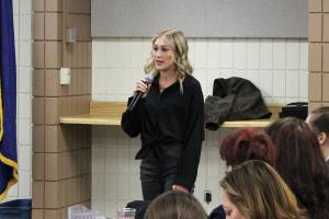 Incoming Soldotna Chamber of Commerce Executive Director Maddy McElrea addresses attendees at a chamber luncheon on Wednesday, Feb. 8, 2023 in Soldotna, Alaska. (Ashlyn OHara/Peninsula Clarion)
