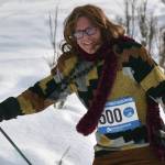 C.O. Rudstrom climbs a hill at the 19th annual Ski For Women on Sunday, Feb. 12, 2023, at Tsalteshi Trails just outside of Soldotna, Alaska. Rudstrom won the Fiercest Drag award. (Photo by Jeff Helminiak/Peninsula Clarion)