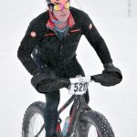 Eric Thomason finishes first in the mens 20-kilometer fat bike at the 6th Annual Tour of Tsalteshi on Sunday at Tsalteshi Trails just outside of Soldotna. (Photo by Jeff Helminiak/Peninsula Clarion)
