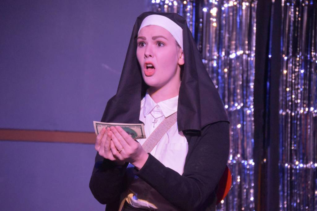 Alyeska Garrett portrays Sister Mary during a rehersal of Disaster! on Tuesday, Feb. 21, 2023, at the Kenai Performers Theater in Soldotna, Alaska. (Jake Dye/Peninsula Clarion)