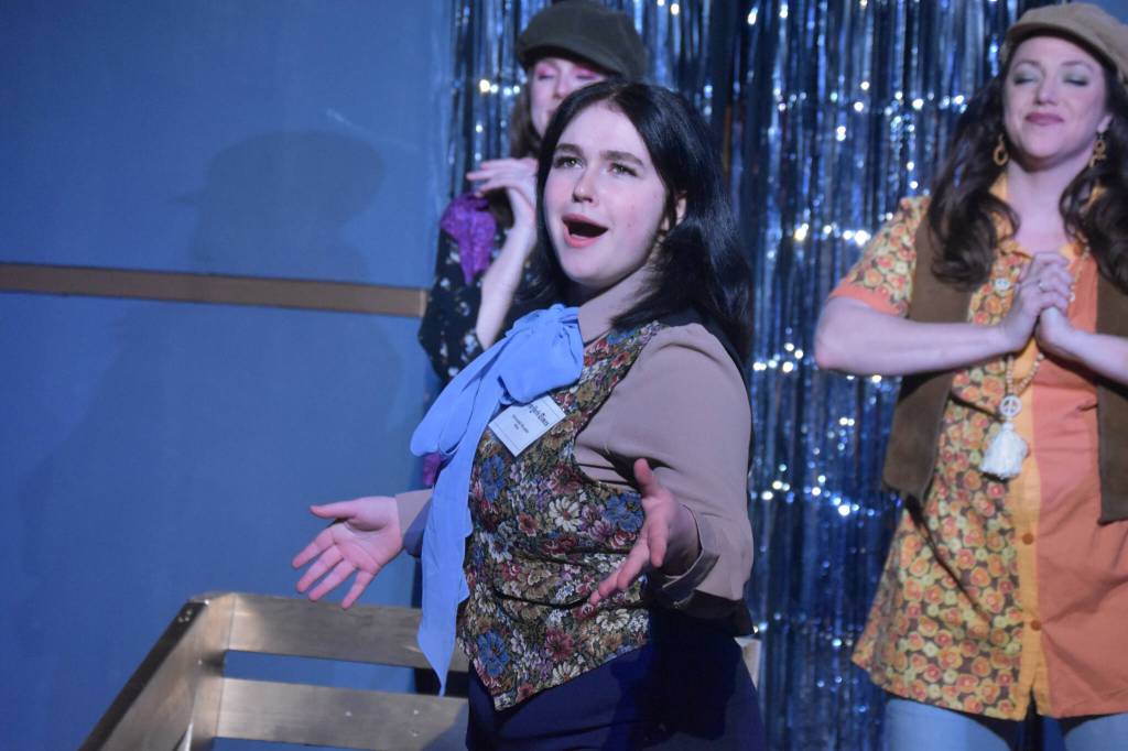 Charli Byrd delivers a solo as Marianne during a rehersal of Disaster! at the Kenai Performers Theater in Soldotna, Alaska. (Jake Dye/Peninsula Clarion)