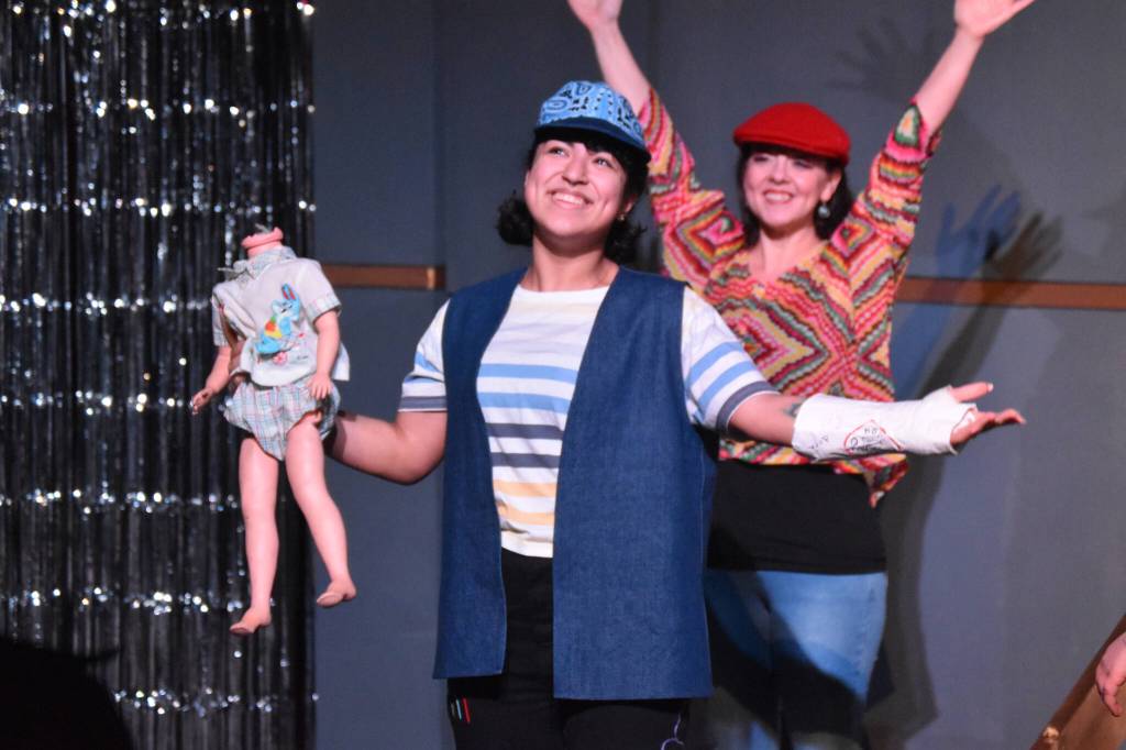 Kassandra Feltman portrays Ben during a rehersal of Disaster! at the Kenai Performers Theater in Soldotna, Alaska. Feltman plays a dual role in the show, as twins Ben and Lisa. (Jake Dye/Peninsula Clarion)