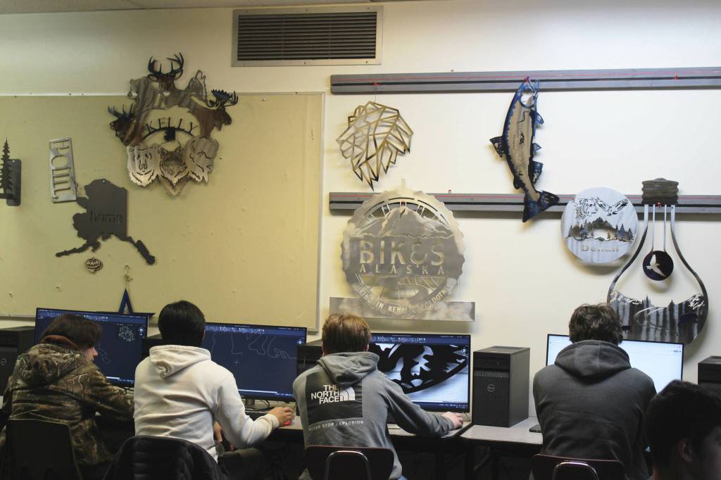 Students at Kenai Central High School create designs using CAD/CAM software during a class on Wednesday, Feb. 22, 2023 in Kenai, Alaska. (Ashlyn OHara/Peninsula Clarion)