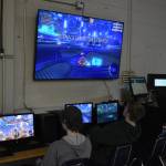 Soldotna High School esports players Ethan Boehme, Graehm LeFevre and Bryce LeFevre participate in a Rocket League practice match on Thursday, Feb. 23, 2023, at Skyview Middle School in Soldotna, Alaska. (Jake Dye/Peninsula Clarion)