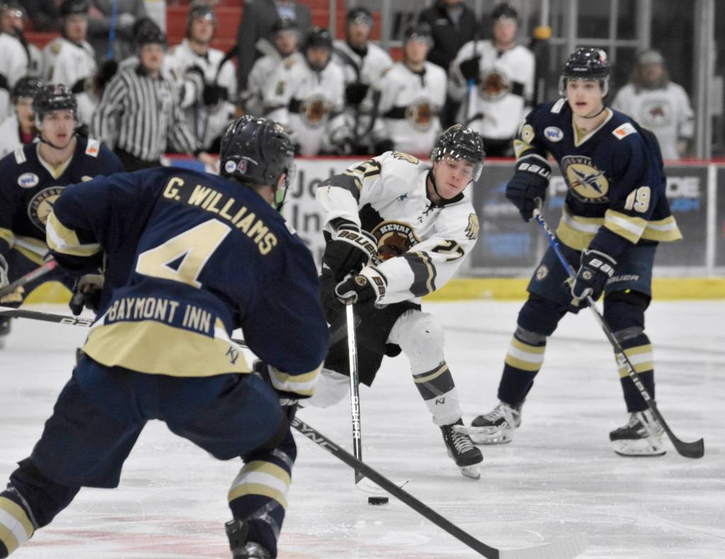 Kenai River Brown Bears forward Garett Drotts carries the puck against the Janesville (Wisconsin) Jets on Saturday, Feb. 25, 2023, at the Soldotna Regional Sports Complex in Soldotna, Alaska. (Photo by Jeff Helminiak/Peninsula Clarion)