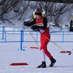 Kenais Logan Cartwright makes the final stretch towards the hand-off at the end of the first leg of the boys 4x5-kilometer relay at the ASAA State Nordic Ski Championships at Kincaid Park in Anchorage, Alaska, on Saturday, Feb. 25, 2023. (Jake Dye/Peninsula Clarion)