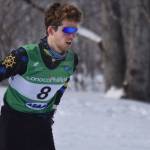 Seamus McDonough, of Homer, rounds a bend during the boys 4x5-kilometer relay at the ASAA State Nordic Ski Championships at Kincaid Park in Anchorage, Alaska, on Saturday, Feb. 25, 2023. (Jake Dye/Peninsula Clarion)