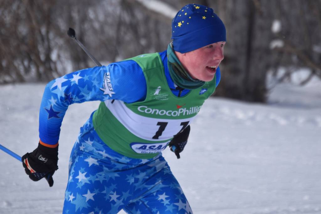 Bennjamin Abel, of Soldotna, pushes through the second leg of the boys 4x5-kilometer relay at the ASAA State Nordic Ski Championships at Kincaid Park in Anchorage, Alaska, on Saturday, Feb. 25, 2023. (Jake Dye/Peninsula Clarion)