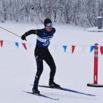 Jody Goodrich pushes through the final leg of the boys 4x5-kilometer relay at the ASAA State Nordic Ski Championships at Kincaid Park in Anchorage, Alaska, on Saturday, Feb. 25, 2023. (Jake Dye/Peninsula Clarion)