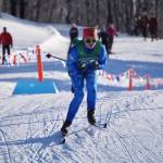 Ariana Cannava, of Soldotna, tucks for a downhill during the girls 4x3.5-kilometer relay at the ASAA State Nordic Ski Championships at Kincaid Park in Anchorage, Alaska, on Saturday, Feb. 25, 2023. (Jake Dye/Peninsula Clarion)