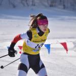 Kenais Mya Taylor pushes through the third leg of the girls 4x3.5-kilometer relay at the ASAA State Nordic Ski Championships at Kincaid Park in Anchorage, Alaska, on Saturday, Feb. 25, 2023. (Jake Dye/Peninsula Clarion)