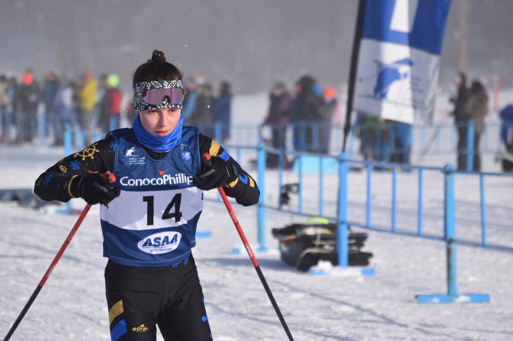 Eryn Field, of Homer, sets out on the last leg of the girls 4x3.5-kilometer relay at the ASAA State Nordic Ski Championships at Kincaid Park in Anchorage, Alaska, on Saturday, Feb. 25, 2023. (Jake Dye/Peninsula Clarion)