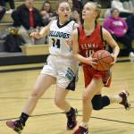 Nikiskis Avery Ellis defends Kenai Centrals Rylie Sparks on Tuesday, Feb. 28, 2023, at Nikiski Middle-High School in Nikiski, Alaska. (Photo by Jeff Helminiak/Peninsula Clarion)