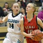 Nikiski's Avery Ellis defends Kenai Central's Rylie Sparks on Tuesday, Feb. 28, 2023, at Nikiski Middle-High School in Nikiski, Alaska. (Photo by Jeff Helminiak/Peninsula Clarion)