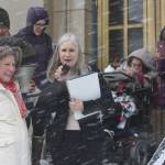 State Rep. Andi Story, D-Juneau, advocates for more state funding on behalf of Alaska residents with disabilities so they can live as independently as possible with the help of service providers during a rally in a heavy snowstorm at midday Wednesday on the steps of the Alaska State Capitol. (Mark Sabbatini / Juneau Empire)