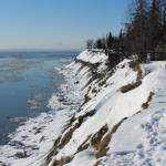 Snow coats an eroding bluff near the mouth of the Kenai River on Friday, March 3, 2023, in Kenai, Alaska. (Ashlyn OHara/Peninsula Clarion)