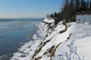 Snow coats an eroding bluff near the mouth of the Kenai River on Friday, March 3, 2023, in Kenai, Alaska. (Ashlyn OHara/Peninsula Clarion)