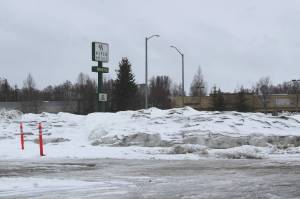 Snow collects in a lot near the Aspen Hotel on Thursday, March 10, 2022, in Soldotna, Alaska. The lot is the site of a planned parking lot by the City of Soldotna. (Ashlyn OHara/Peninsula Clarion)