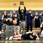 The Ninilchik boys basketball team won the Class 2A Interior Conference title Friday, March 10, 2023, in Glennallen, Alaska. (Photo courtesy of Robin Moore)