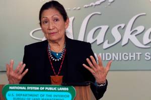 Interior Secretary Deb Haaland gestures while addressing reporters during a news conference, April 21, 2022, in Anchorage, Alaska. Haaland on Tuesday, March 14, 2023, withdrew a 2019 exchange agreement finalized during the Trump administration that has been the subject of ongoing litigation, citing a lack of public participation and environmental review. (AP Photo/Mark Thiessen, File)