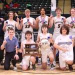 The Ninilchik boys basketball team celebrates their second straight Class 2A state championship Saturday, March 18, 2023, at the Alaska Airlines Center in Anchorage, Alaska. (Photo courtesy of Robin Moore)