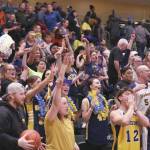 Ninilchik fans celebrate the teams second straight Class 2A boys state basketball championship Saturday, March 18, 2023, at the Alaska Airlines Center in Anchorage, Alaska. (Photo courtesy of Robin Moore)