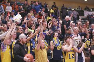 Ninilchik fans celebrate the team's second straight Class 2A boys state basketball championship Saturday, March 18, 2023, at the Alaska Airlines Center in Anchorage, Alaska. (Photo courtesy of Robin Moore)