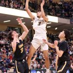 Ninilchiks Jaylin Scott soars to the basket against Tikigaq during the Class 2A boys state championship Saturday, March 18, 2023, at the Alaska Airlines Center in Anchorage, Alaska. (Photo courtesy of Robin Moore)