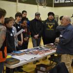Bruce Jaffa, of Jaffa Construction, speaks to a group of students at Seward High Schools Career Day on Thursday, March 23, 2023, at Seward High School in Seward, Alaska. (Jake Dye/Peninsula Clarion)