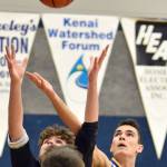 Cook Inlet Academy sophomore Ian McGarry battles for a rebound against Birchwood Christian on Saturday, Jan. 21, 2023, at Cook Inlet Academy just outside of Soldotna, Alaska. (Photo by Jeff Helminiak/Peninsula Clarion)