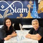 Owners Suwannasa Piwon and Phatcharin Apaipak sit for a photo at the new location of their Siam Noodles and Food in Soldotna, Alaska. (Photo provided by Siam Noodles and Food)