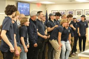 The Soldotna High School hockey team is recognized for winning the 2023 Division II state hockey championship during a Kenai Peninsula Borough Assembly meeting on Tuesday, April 4, 2023, in Soldtona, Alaska. (Ashlyn OHara/Peninsula Clarion)